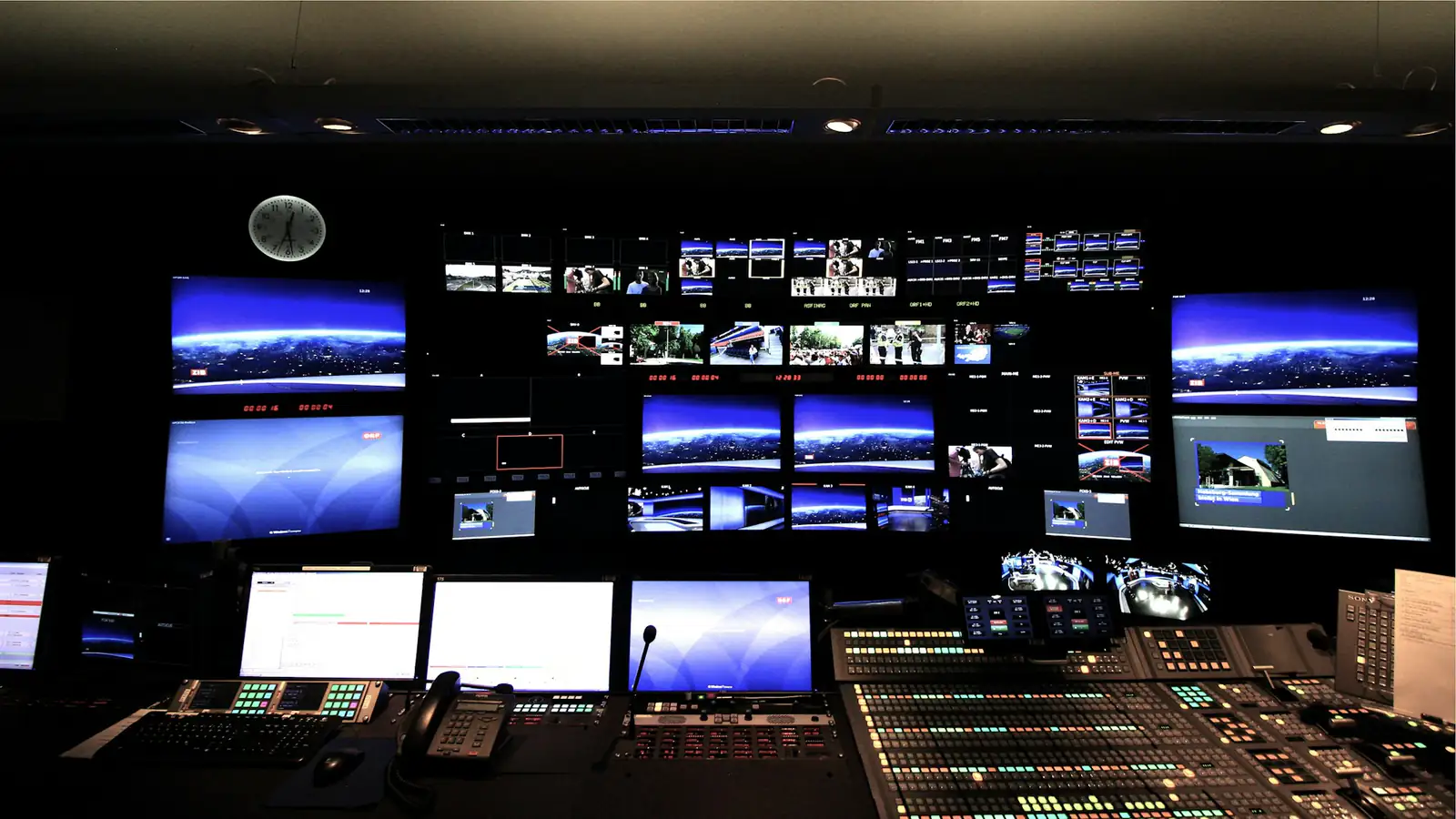 Operations room with rows of live video screens